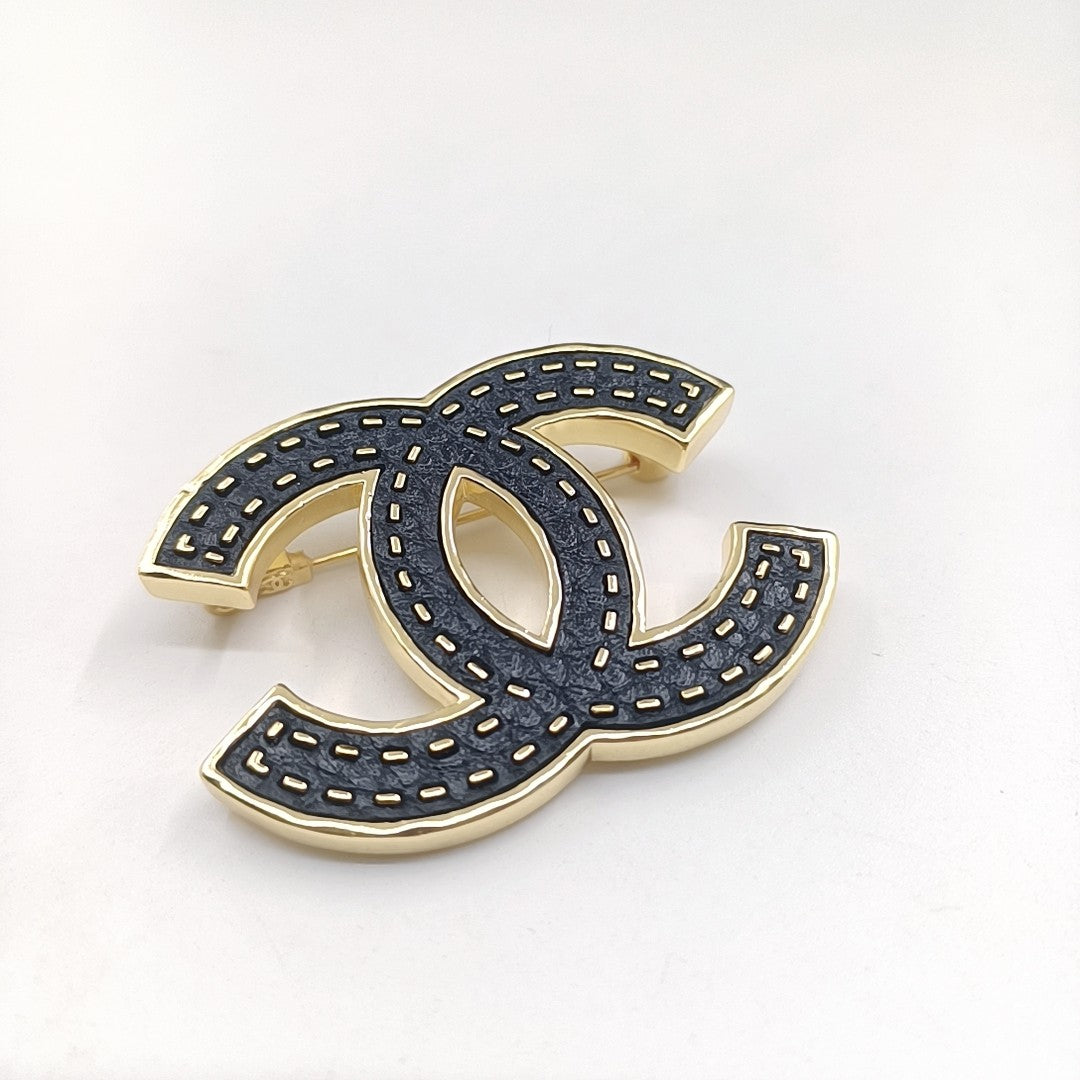 18K Chanel Black Brooch